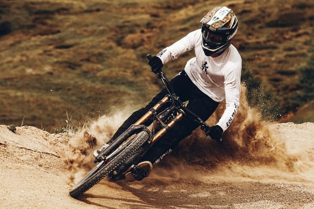 Downhill mountain biking at Mottolino Bikepark, Livigno — Dirty Bikes Photo