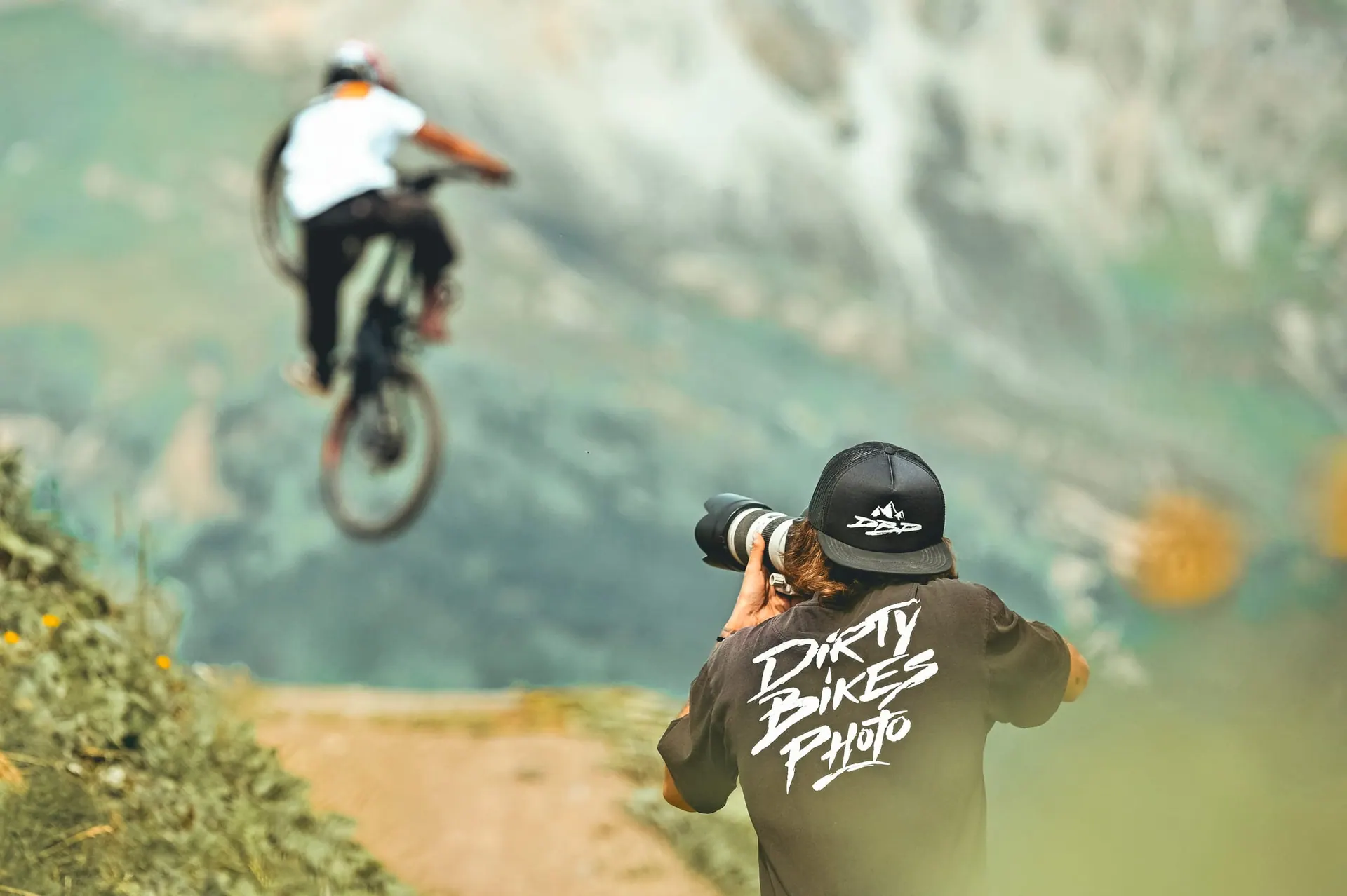 Dirty Bikes Photo photographer shooting a rider mid-descent
